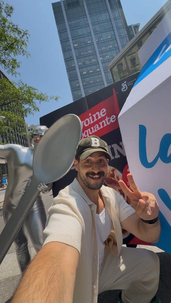 Creator taking a selfie at an outdoor brand activation